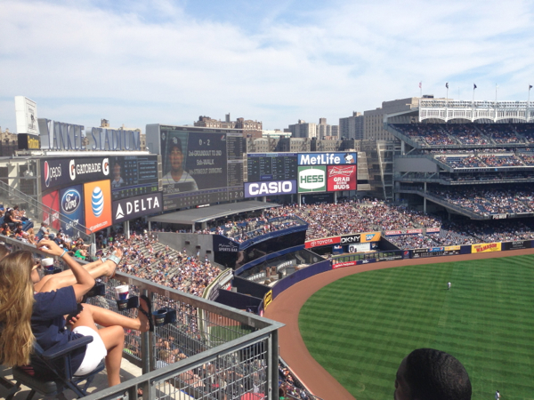 The outfield, bleachers and the huge scoreboard at Yankee Stadium